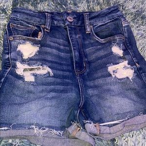 Blue ripped jean shorts